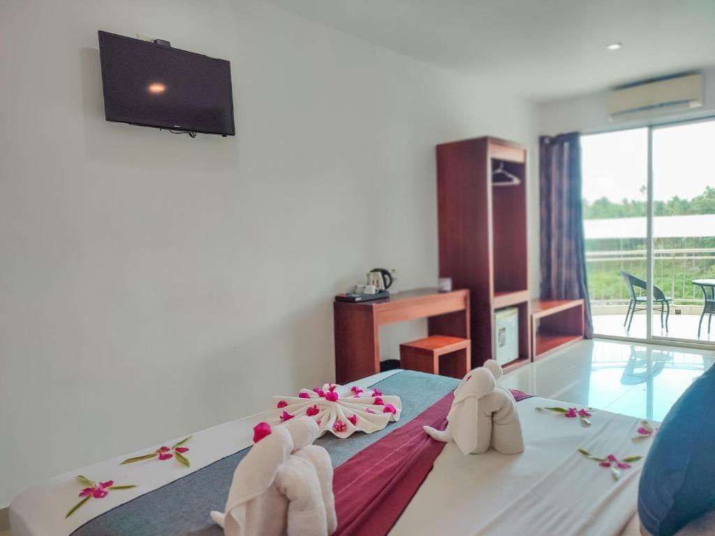 Postel nebo postele na pokoji v ubytování Hotel Elephant Park - NEW DEAL! Half Off Airport Pickups Available