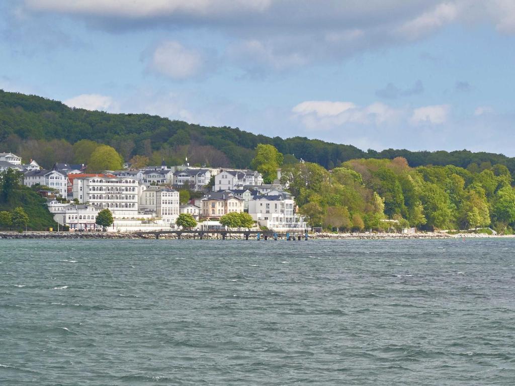 a town on the shore of a body of water at Ostseeresidenz Sassnitz F548 WG 7 mit Sauna, Terrasse, Meerblick in Sassnitz