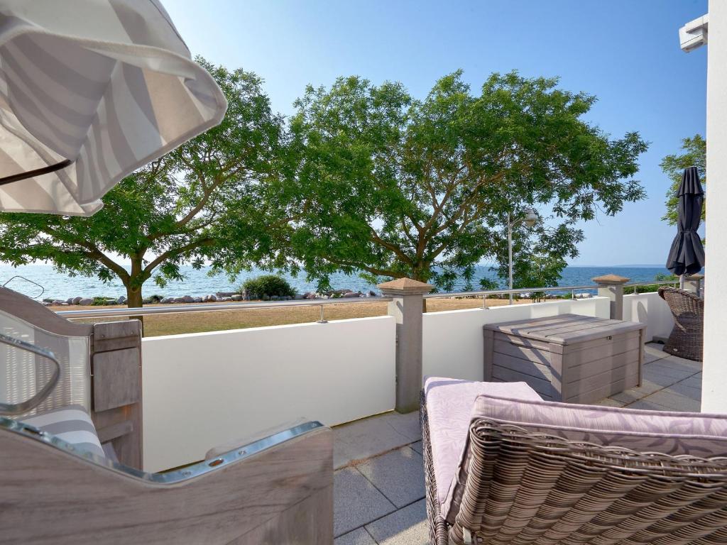 Balkón nebo terasa v ubytování Ostseeresidenz Sassnitz - WG 7 mit Sauna, Terrasse, Meerblick