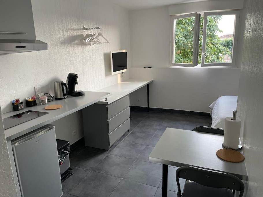 Dapur atau dapur kecil di Studio6 proche Fac climatisé