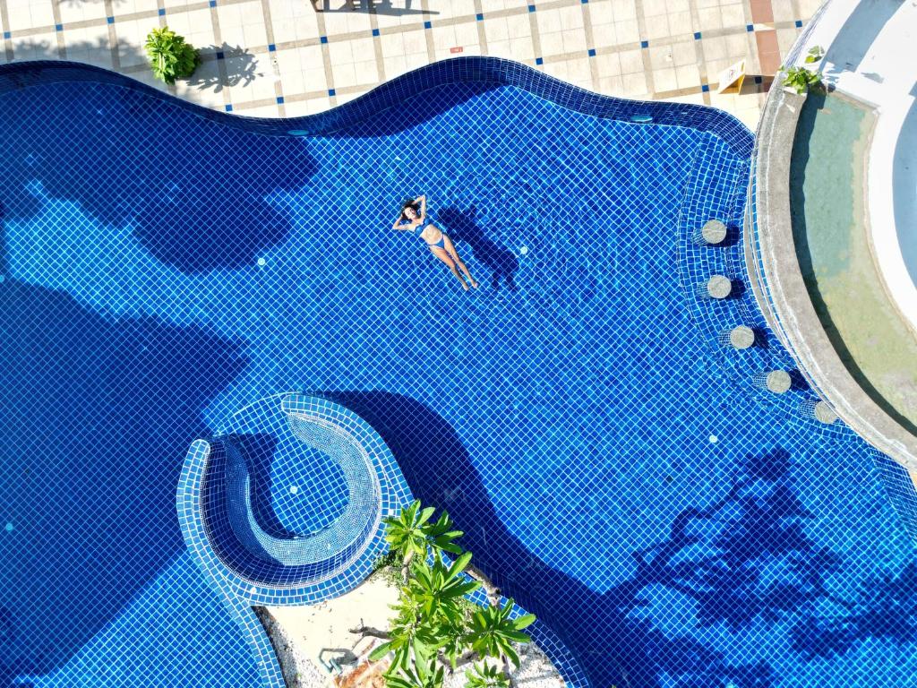 Bazén v ubytování Phuket Leelavadee Hua Ting Resort nebo v jeho okolí