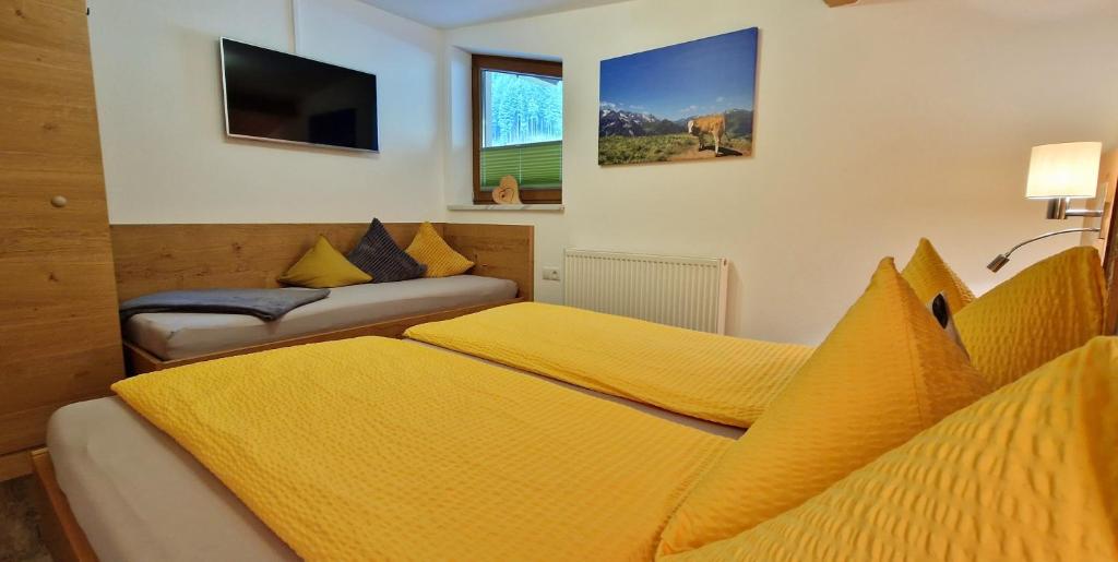 Postel nebo postele na pokoji v ubytování Haus Marchegg