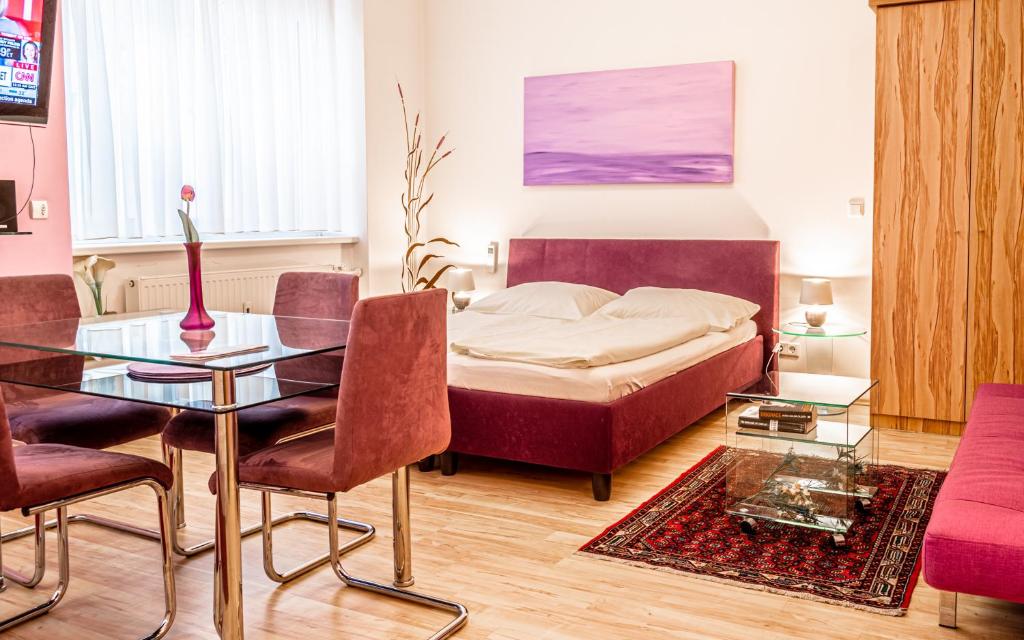 Ein Bett oder Betten in einem Zimmer der Unterkunft Central Apartments Vienna - CAV