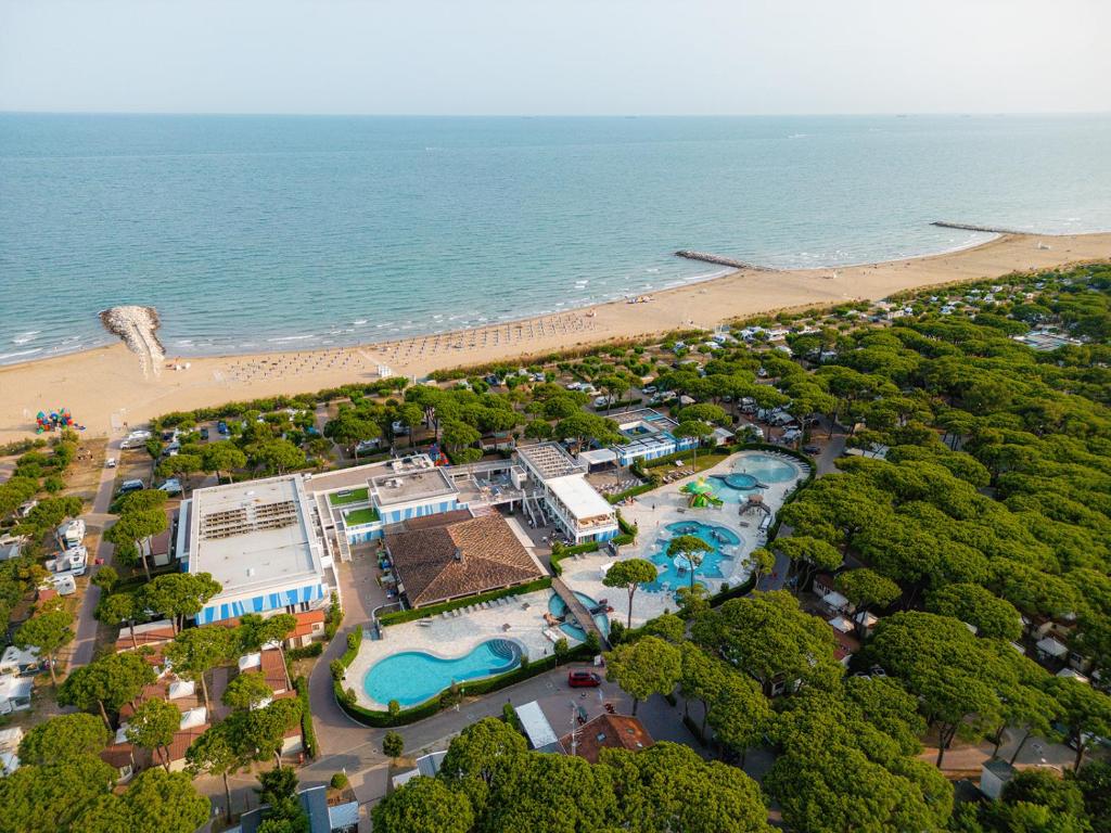 an aerial view of a resort and the beach at Glamping Cavallino in Cavallino-Treporti