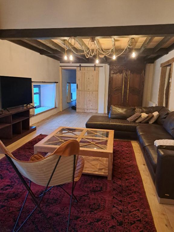 Posezení v ubytování Gîte Les 3 pierres