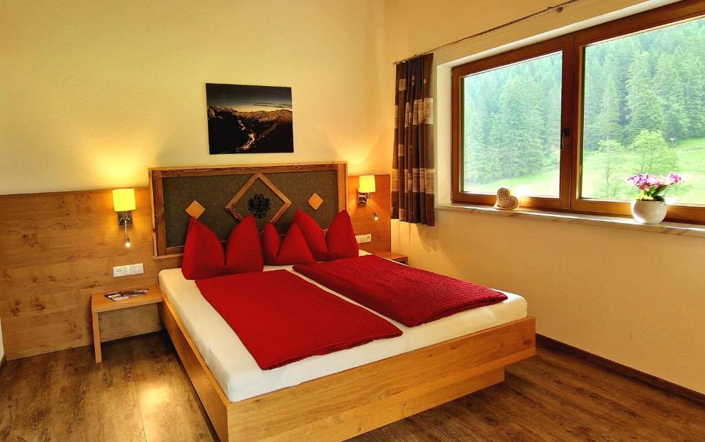 Postel nebo postele na pokoji v ubytování Haus Marchegg