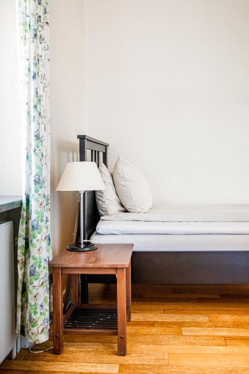 Postel nebo postele na pokoji v ubytování Saga Hotell