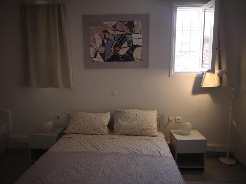 Postel nebo postele na pokoji v ubytování Apartments Jasu