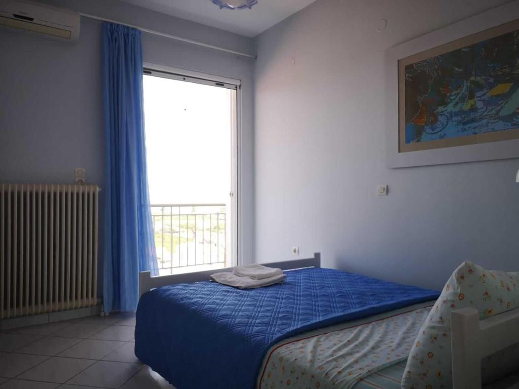Postel nebo postele na pokoji v ubytování Apartments Jasu