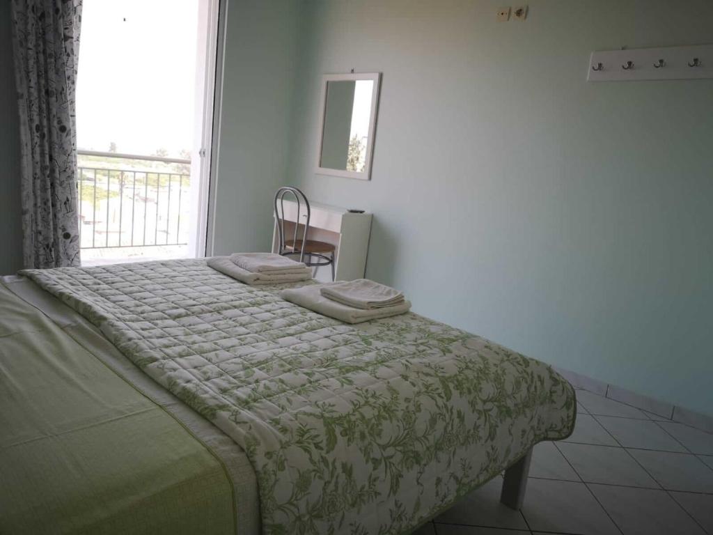 Postel nebo postele na pokoji v ubytování Apartments Jasu