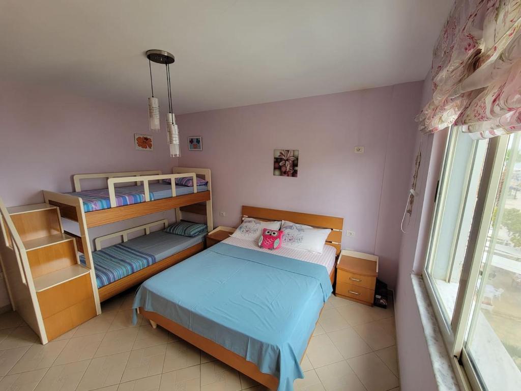 Postel nebo postele na pokoji v ubytování Beko - Apartment with sea view in Durres