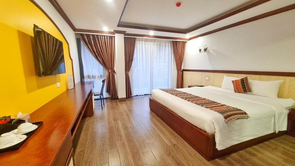 Postel nebo postele na pokoji v ubytování Le Chapa Hotel & Spa