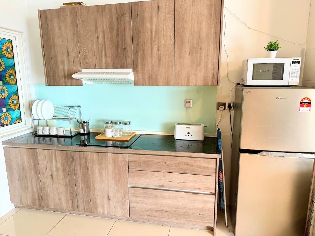 Kuchyň nebo kuchyňský kout v ubytování Comfy+ by ARH KLCC