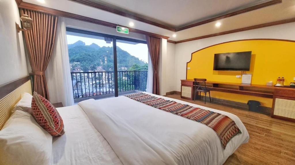 Postel nebo postele na pokoji v ubytování Le Chapa Hotel & Spa