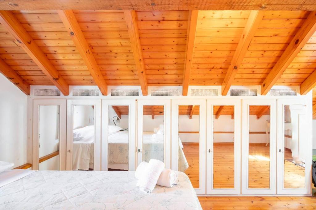 Postel nebo postele na pokoji v ubytování St. George Villa