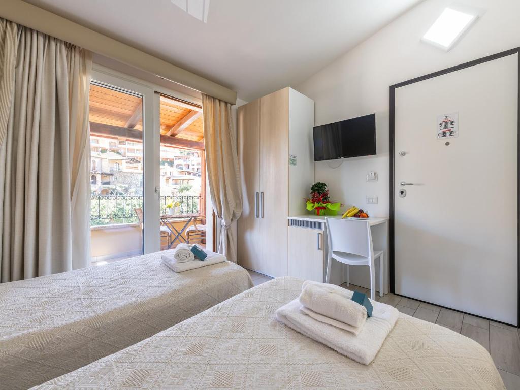 Postel nebo postele na pokoji v ubytování B&B Simius Bay