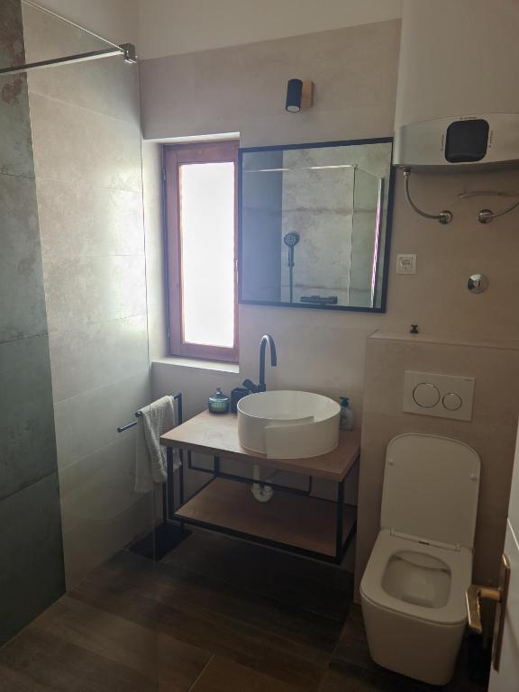 Kúpeľňa v ubytovaní Apartmani Meštrović