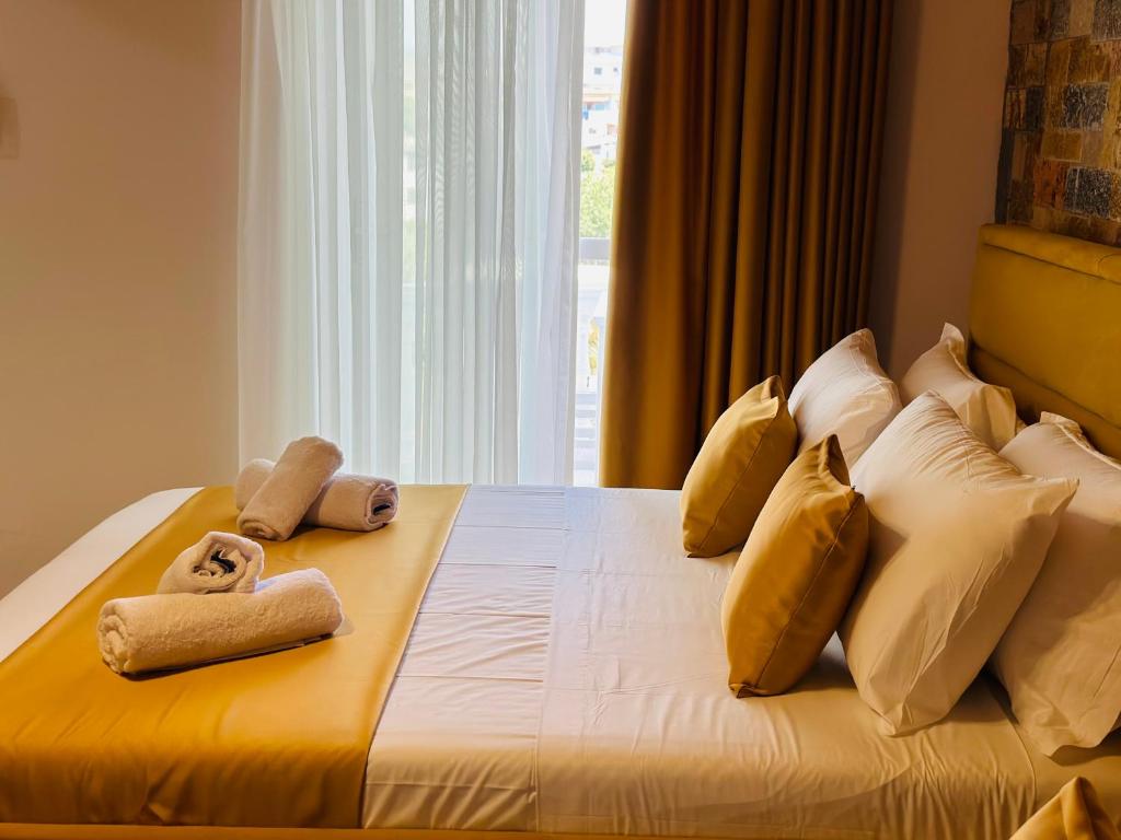 Cama o camas de una habitación en ILLYRIAN hotel Ksamil
