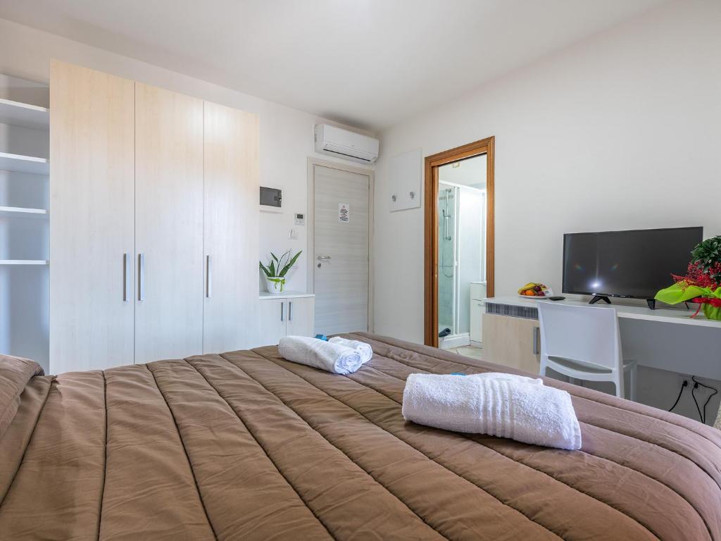 Postel nebo postele na pokoji v ubytování B&B Simius Bay