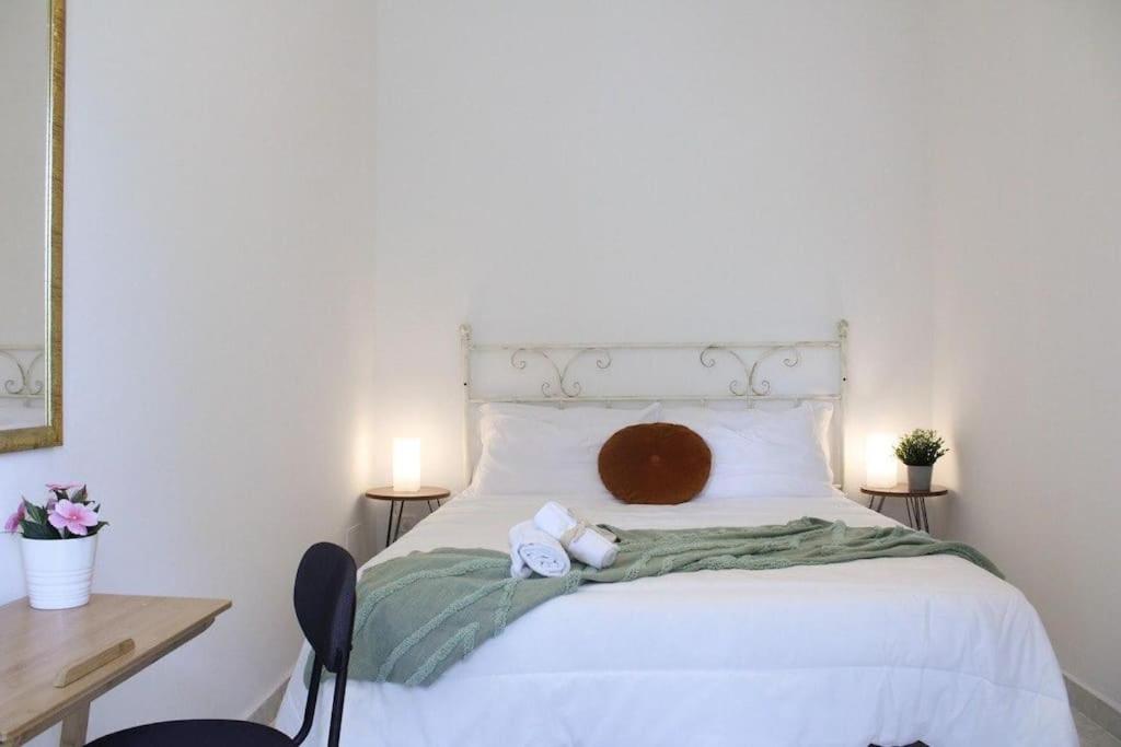 Postelja oz. postelje v sobi nastanitve [Centrale] Luminosa Camera Wi-Fi Clima Parcheggio