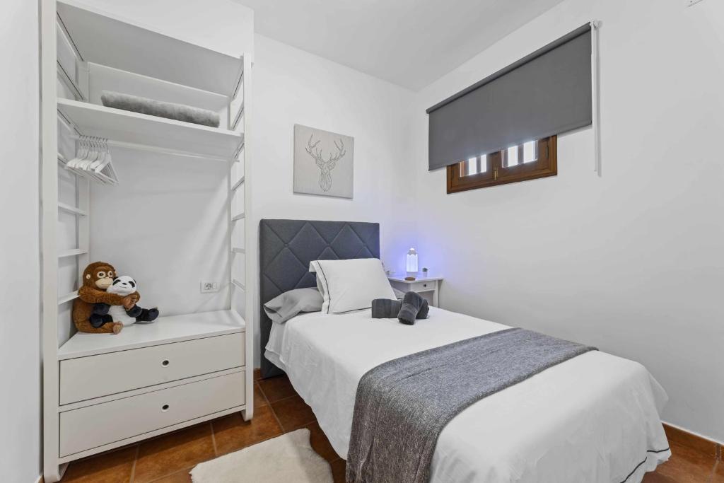 Postel nebo postele na pokoji v ubytování Holyhome mills 1113