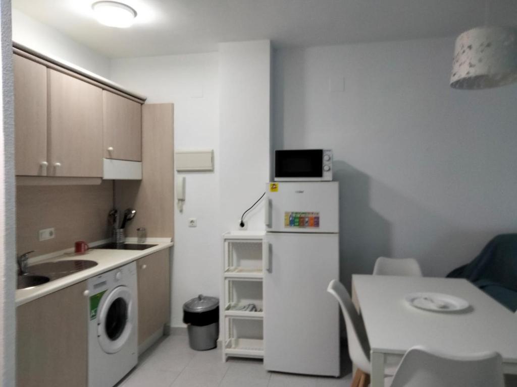 Kuchnia lub aneks kuchenny w obiekcie APART CLUB LABARROSA