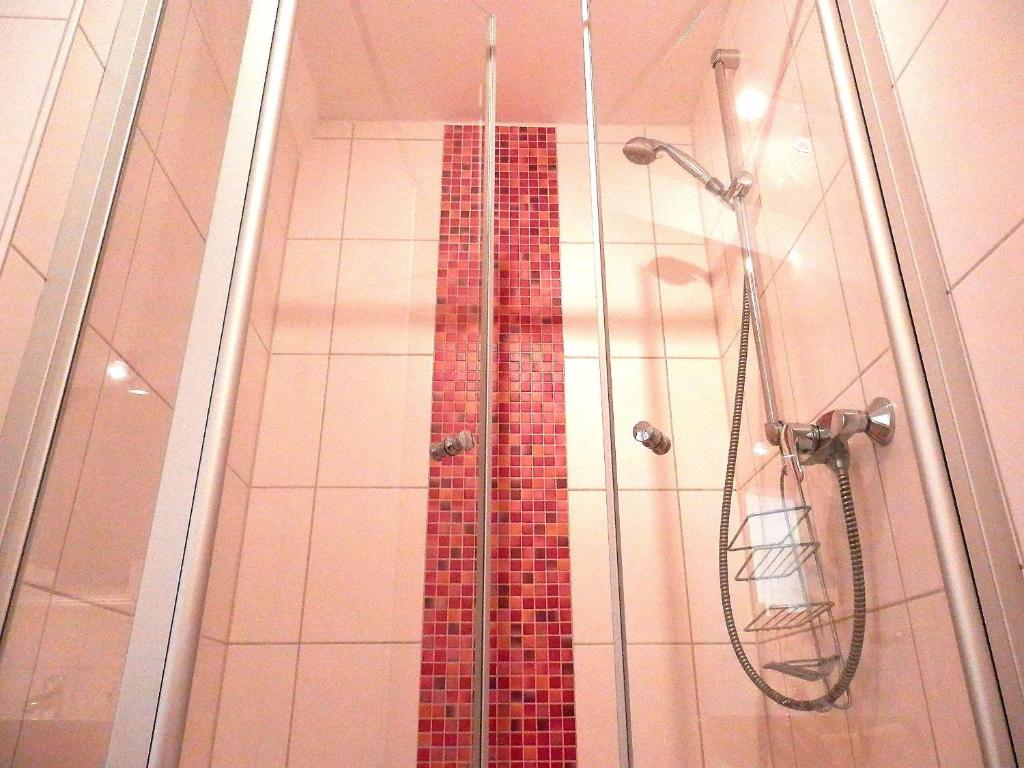 Koupelna v ubytování Gästezimmer / Weingut Peter