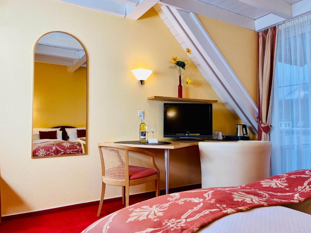 Postel nebo postele na pokoji v ubytování Im Winkel Appartements und Zimmer