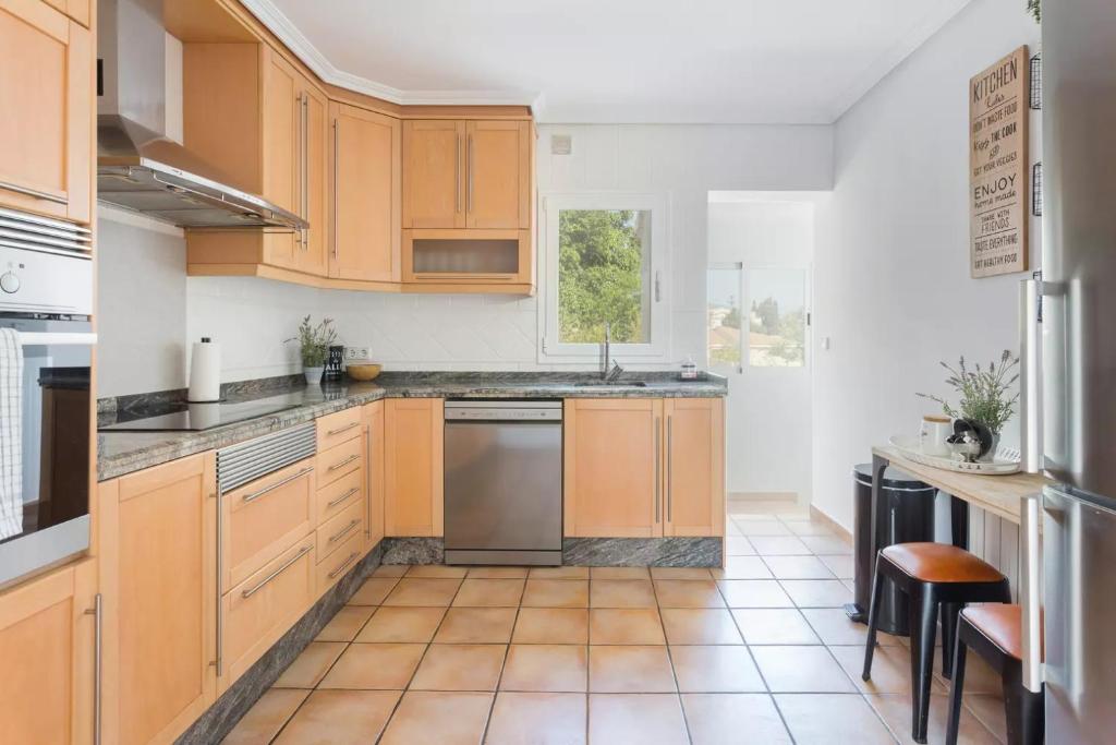 Kuchyň nebo kuchyňský kout v ubytování Villa Pino