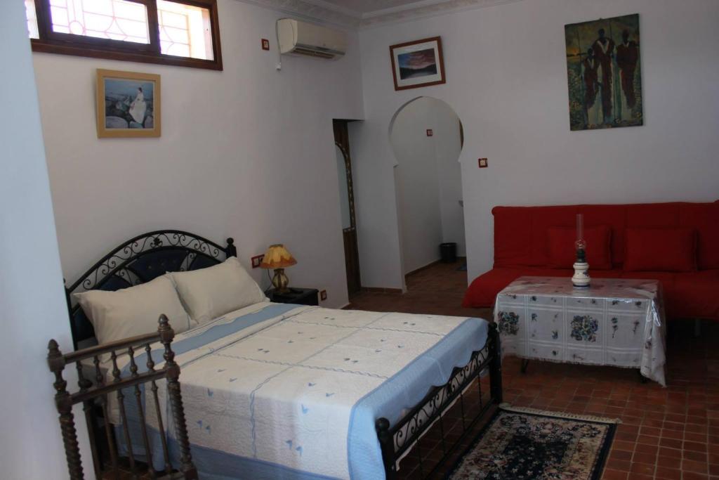 Postel nebo postele na pokoji v ubytování Rayani Maison d'Hôtes