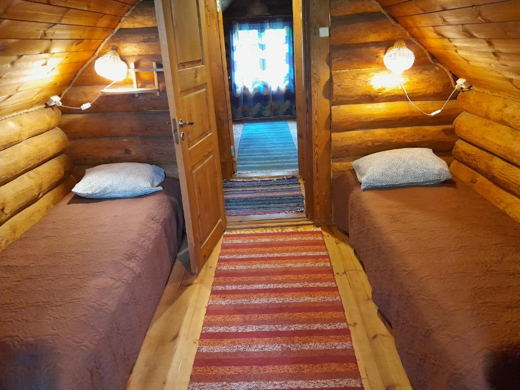 Postel nebo postele na pokoji v ubytování Käbi Holiday Homes