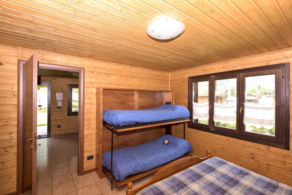 Postel nebo postele na pokoji v ubytování Margherita Camping & Resort