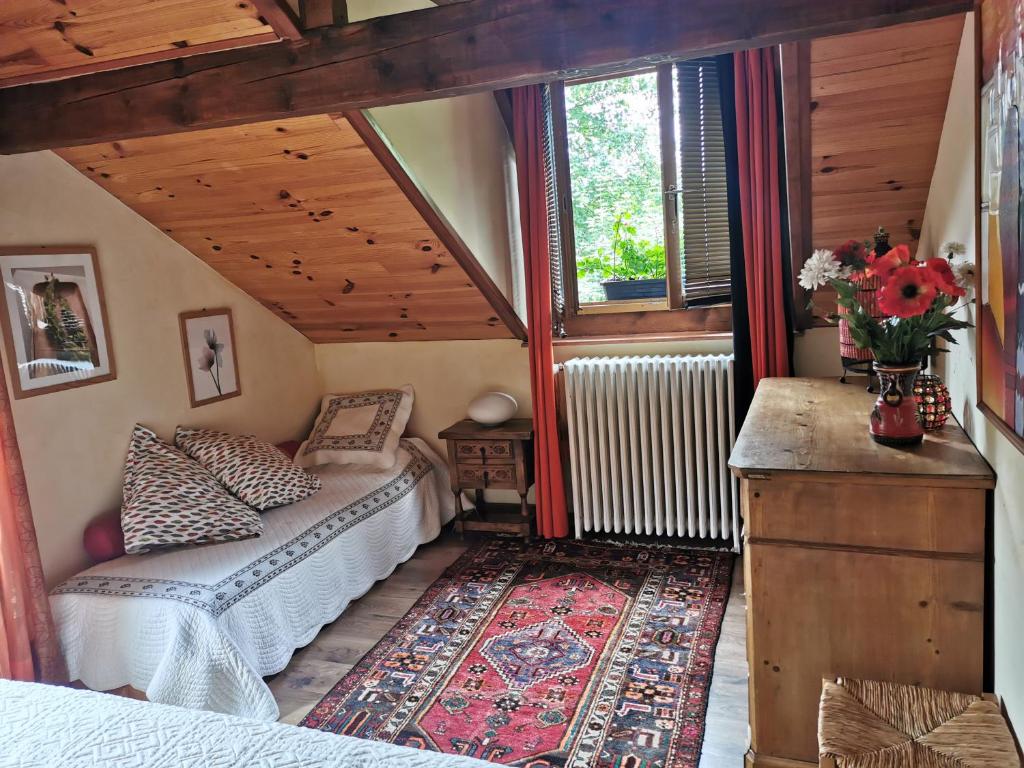 Postel nebo postele na pokoji v ubytování La grange à Léon
