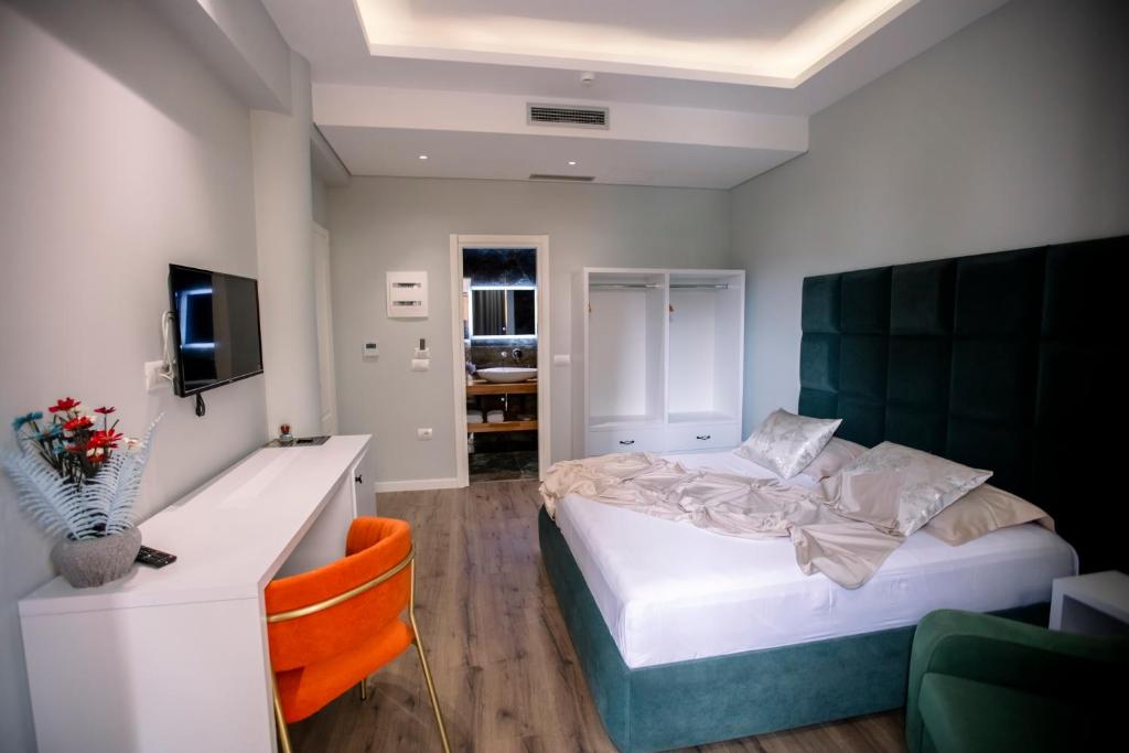 Postel nebo postele na pokoji v ubytování Hotel Olsi