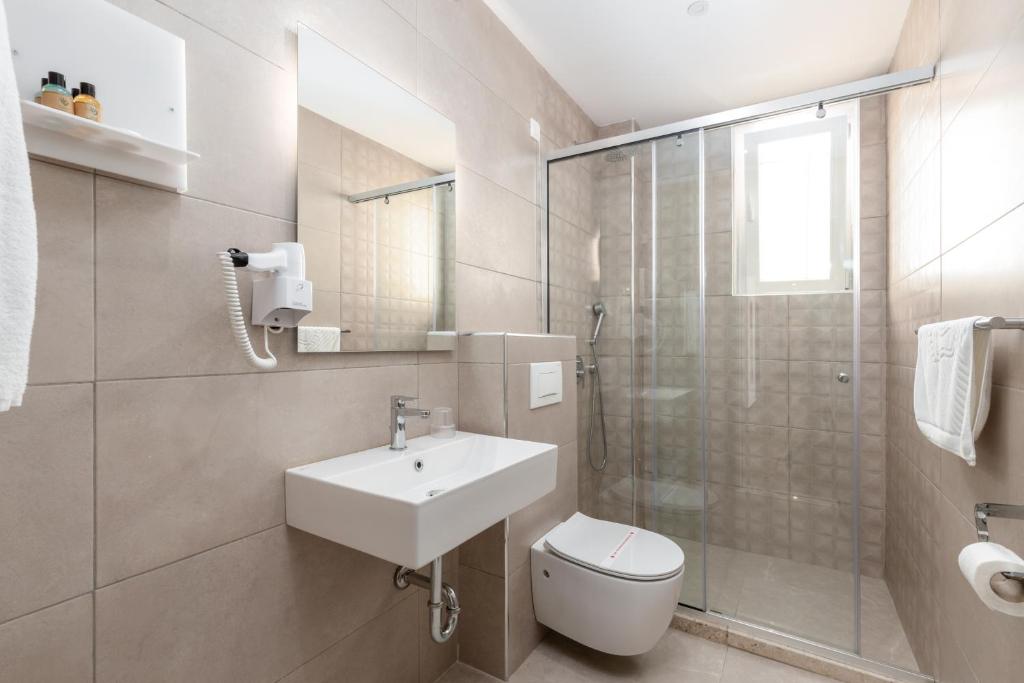 Koupelna v ubytování Hotel Olea