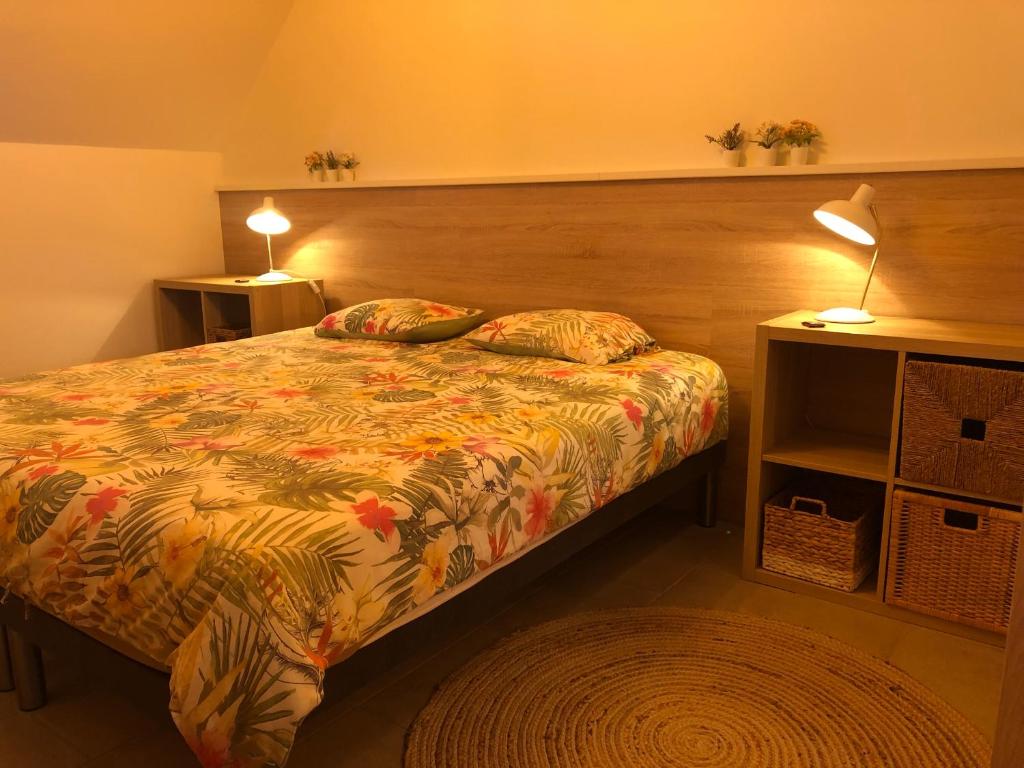 Postel nebo postele na pokoji v ubytování Au Coeur des Collines, Noisette