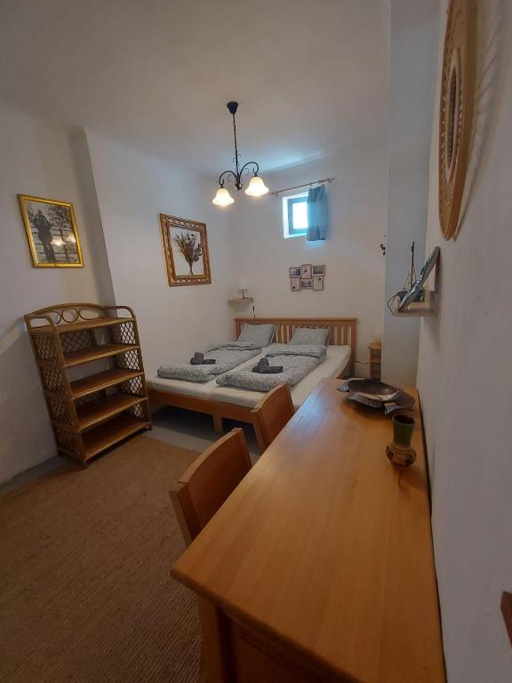 Postel nebo postele na pokoji v ubytování Tisza-tavi Kiserdő Vendégház