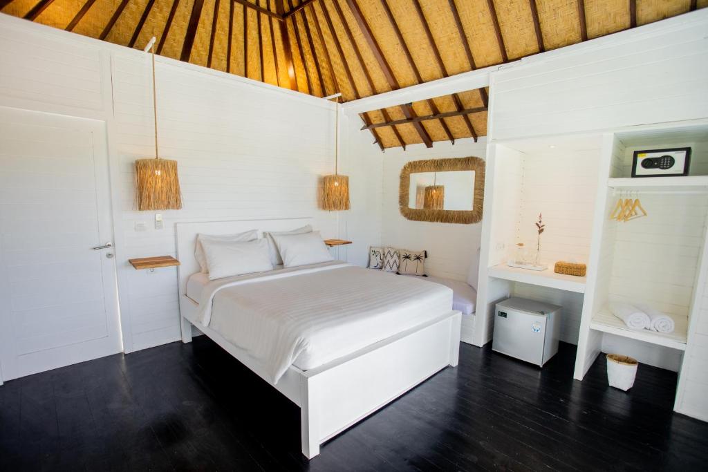 Postel nebo postele na pokoji v ubytování Stardust Villas
