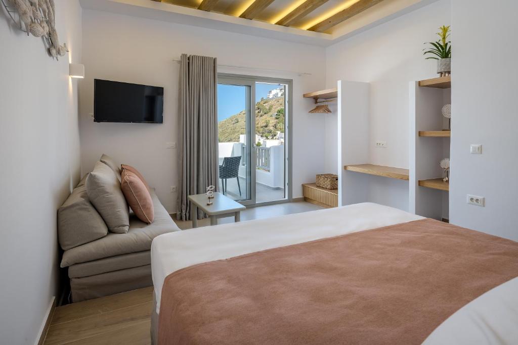 Postel nebo postele na pokoji v ubytování Vivere Luxury Suites