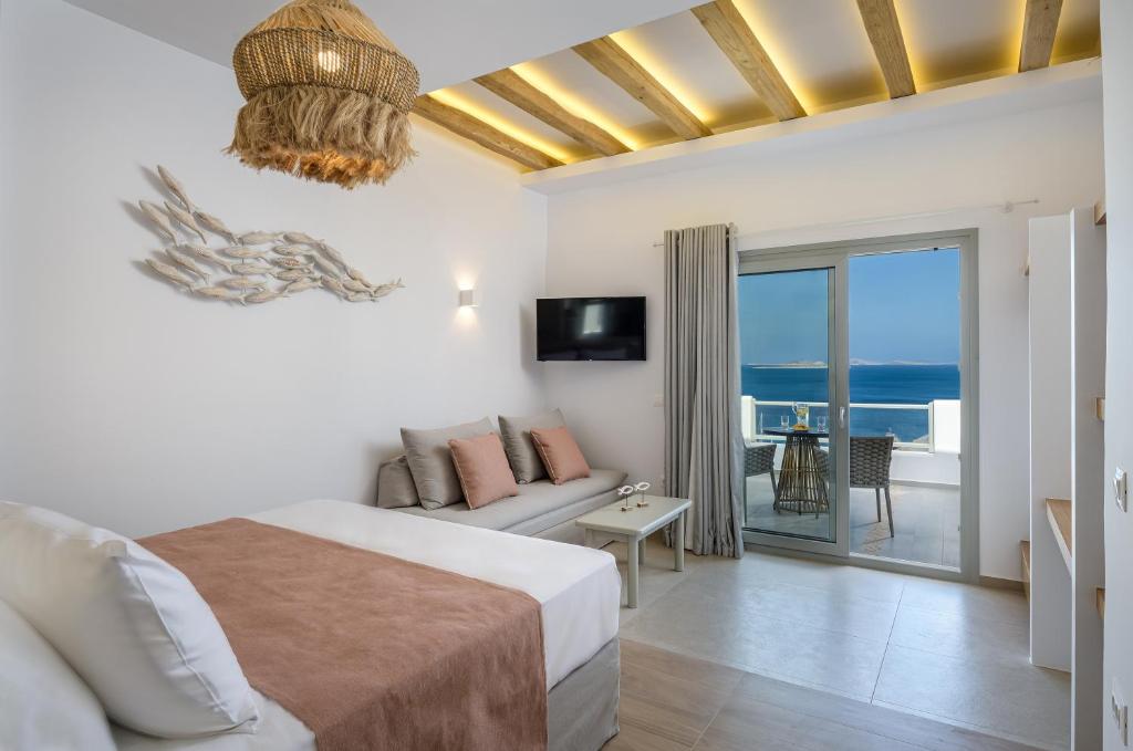 Postel nebo postele na pokoji v ubytování Vivere Luxury Suites