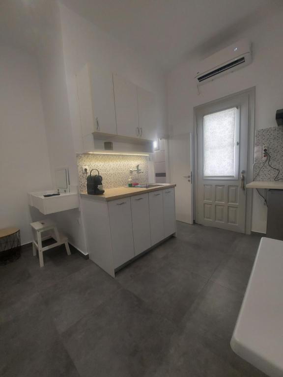 Kuchyňa alebo kuchynka v ubytovaní Anemela studio basic