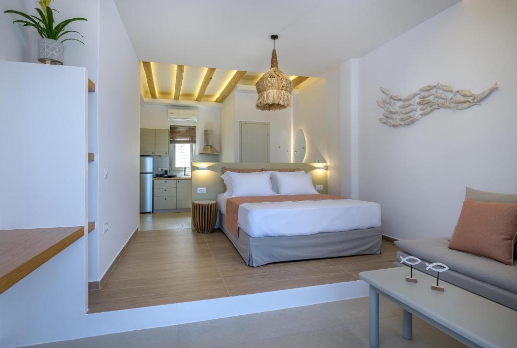 Postel nebo postele na pokoji v ubytování Vivere Luxury Suites