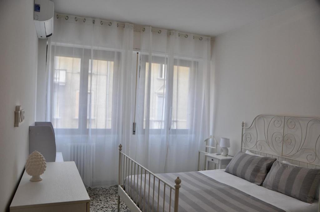 Кровать или кровати в номере M.Aurelio (Nolo) Red