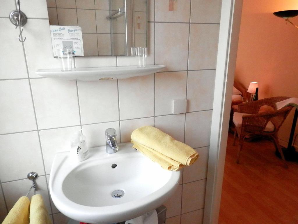 Koupelna v ubytování Gästezimmer / Weingut Peter