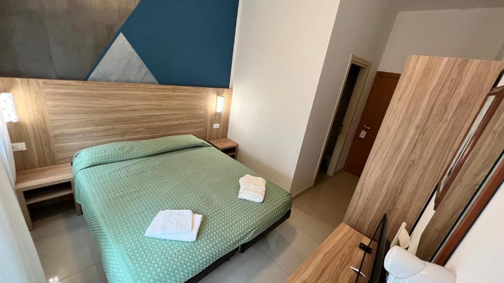 Postel nebo postele na pokoji v ubytování Club Vacanze In