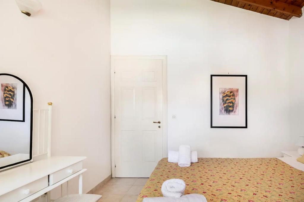 Postel nebo postele na pokoji v ubytování St. George Villa