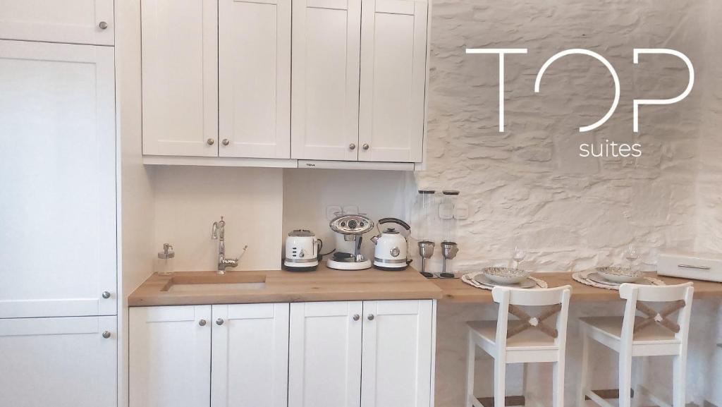 Kuchyň nebo kuchyňský kout v ubytování TOP SUITES