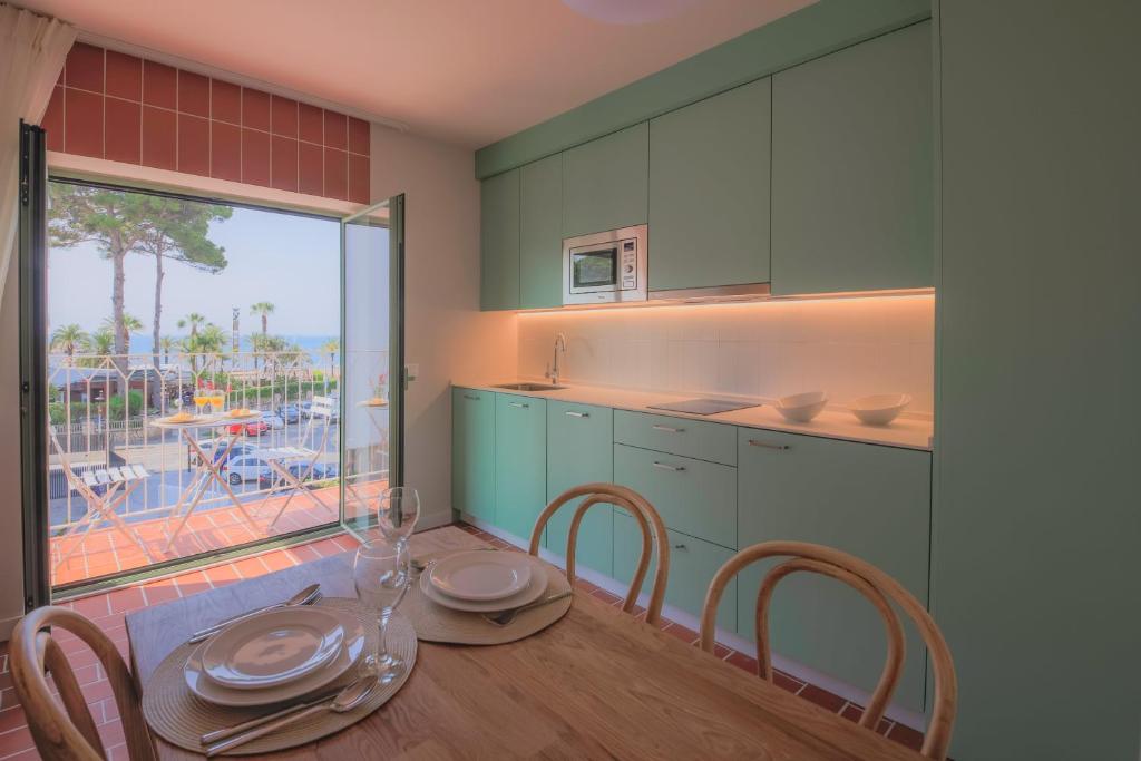 Kuchyň nebo kuchyňský kout v ubytování Terra Aurea Aparthotel