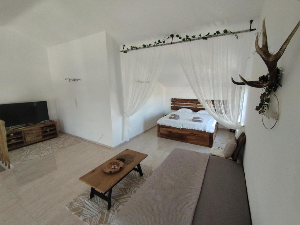 Postel nebo postele na pokoji v ubytování Mandre Duplex Apartment