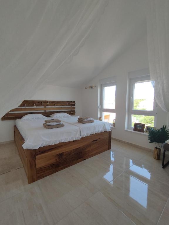 Postel nebo postele na pokoji v ubytování Mandre Duplex Apartment